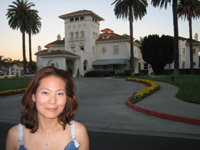 kaela by herself in front'f the hayes mansion